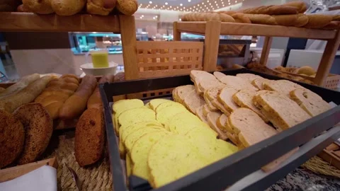 Various types of bread served in the hotel restaurant Stock Footage 296365672