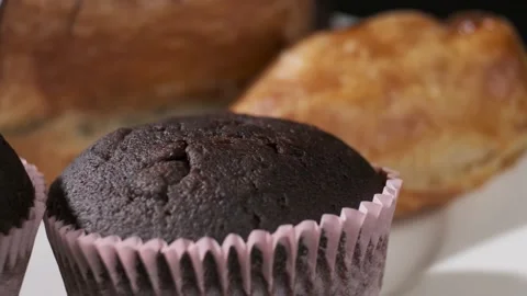 Various types of cakes on white plate rotating in front of camera Stock-Footage 167524543