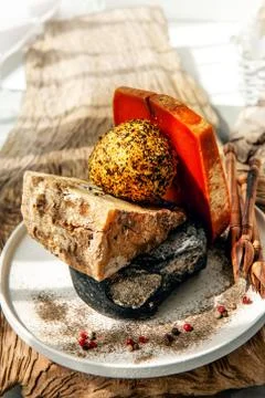 Various types of cheese composition-Stilton, Cheddar, Belper knoll, Thurgau Stock Photos