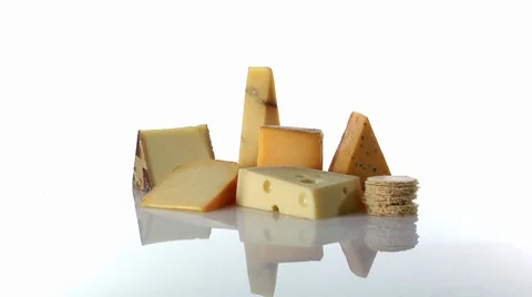Various types of cheese with crackers Stock Footage 8574784
