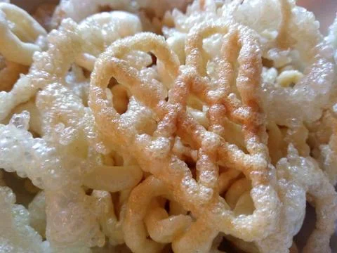 Various types of chips spice fast food. Crispy potato chips cooked food. Фото