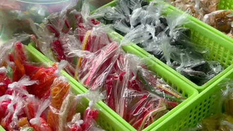 Various types of colorful raw crackers and ingredients Stock Footage 327229043