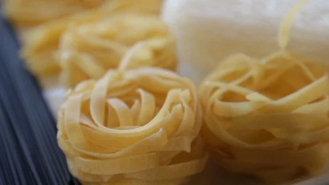 Various types of dry pasta.close-up.macro.the camera moves around this to the Stock Footage 121407353