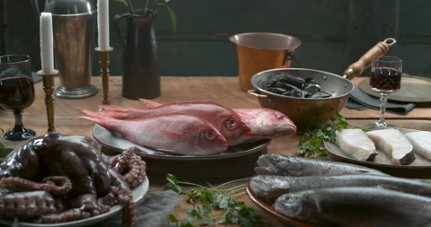 Various types of fresh fish, octopus and muscles arranged on plates and in bowls Stock Footage 199459875