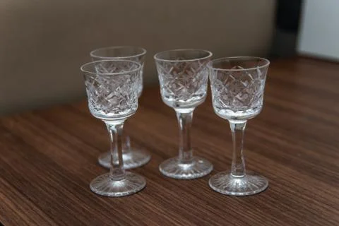 Various types of glasses for wine and vodka. Glasses for drinking Stock Photos