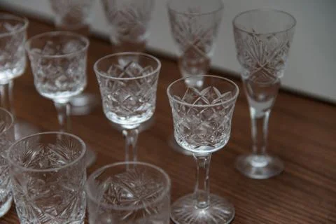 Various types of glasses for wine and vodka. Glasses for drinking Stock Photos
