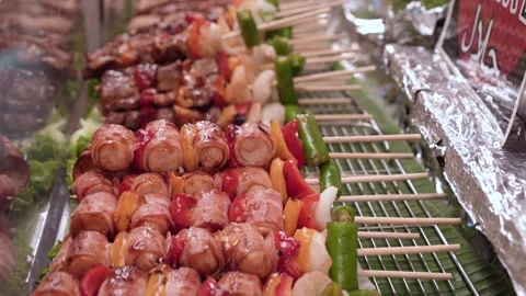 Various types of halal barbecue meat skewer selling at the food stall. 動画素材 300355423