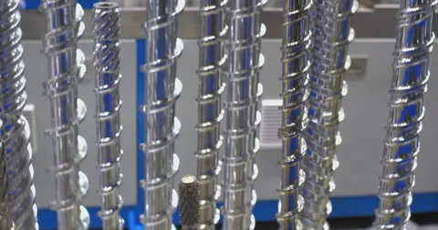 Various types of industrial injection molding machine screws Stock Footage 328643551