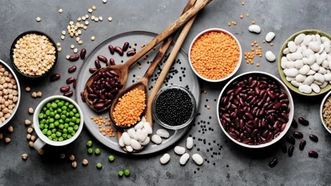 Various types of legumes, beans, lentils, chickpeas and peas. Legume set Stock Footage 283683250