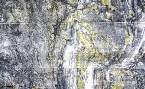 Various types of marble in an abandoned quarry in Ruskeala. Stock Photos