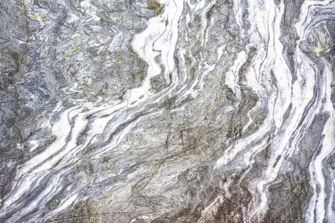 Various types of marble in an abandoned quarry in Ruskeala. Stock Photos