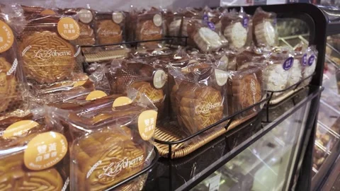 Various types of moon cakes selling at the bakery shop Stock Footage 284734491