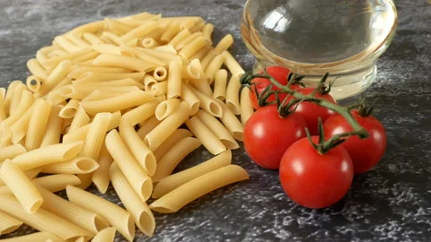 Various types of pasta, Raw pasta set and tomato, set Stock Footage 163572729