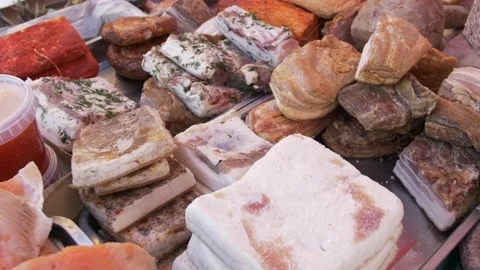 Various types of salted fat, meat, sausages, chicken and ham on the counter Stock Footage 170832400