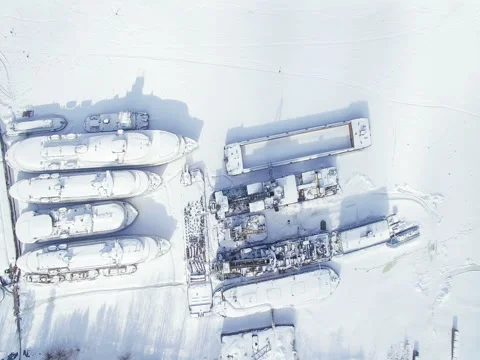 Various types of ships and barges in the backwaters in winter aerial view Stock-Footage 74007881