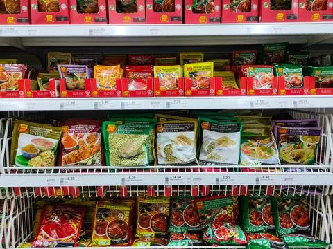 Various types of spices for various types of cuisine sold in a supermarket Stock Photos