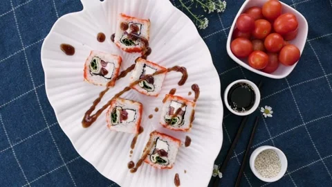 Various types of sushi are beautifully served in a rustic style. beautiful sushi Stock-Footage 148005232