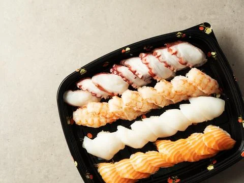 Various types of sushi in packaging Stock Photos