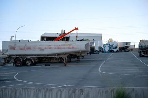 Various types of trucks parked Stock Photos