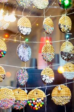 Various types of waffles are on display for sale on the street Stock Photos
