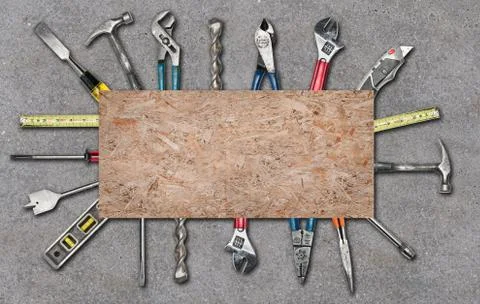 Various used tools on concrete background Stock Photos