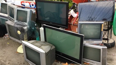 Various used tv sets stand in Bangkok street Stock Footage 109500896