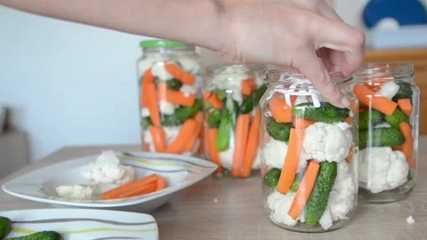 Various vegetables in a jar prepared for home canning. Food. Preservation Stock Footage 139969490