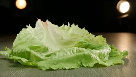 Various vegetables shot on a black background. Turn. Are falling. Stock Footage 117108012