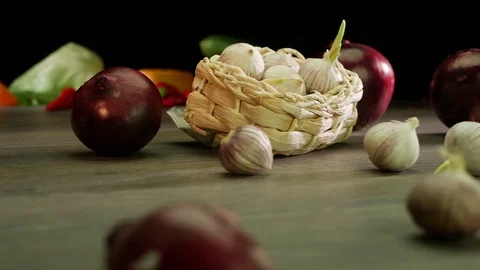Various vegetables shot on a black background. Turn. Are falling. Stock Footage 117110088