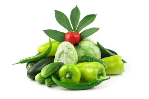 Various vegetables: tomatoes, cabbage, cucumbers, peppers, zucchini and a green Stock Photos