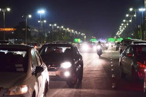 Various vehicles are running on the same road at Night in Jaipur city India. Stock Photos