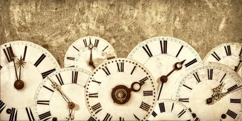 Various vintage clock faces in front of an old wall Stock Illustration