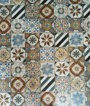 Various vintage tile patterns are laid together in a chic and colorful way. Foto stock