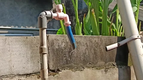 Various Water Faucets for Efficient Water Drainage in Home and Garden Settings Stock Footage 282042782