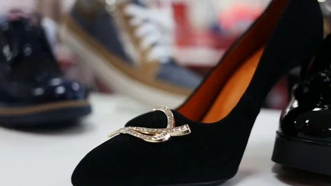 Various women's shoes in a store Stock Footage 72214944
