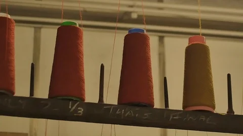 Various wool spools inside a waving mill - Scottish Tartan texite production 스톡 동영상 98886404