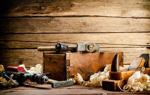 Various working tools on wood on the table. Stock Photos