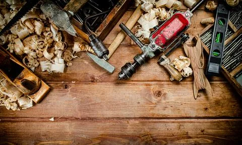 Various working tools on wood on the table. Stock Photos