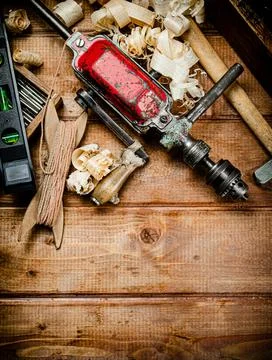 Various working tools on wood on the table. Stock Photos