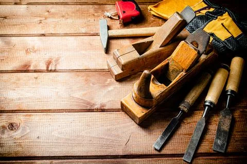 Various working tools on wood on the table. Stock Photos