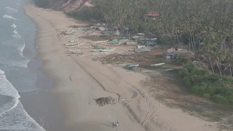 Varkala beach in Kerala, India, 4k aerial ungraded/flat Stock Footage 107886341