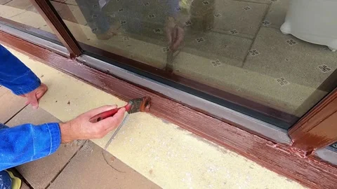Varnishing a Window Sill Stock Footage 204050048