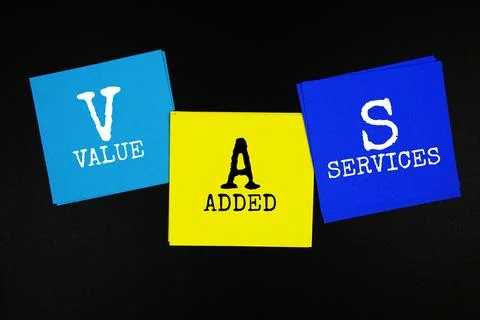 VAS - Value Added Services acronym text on sticky note on black background Stock Photos