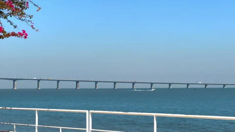 Vasco da Gama Bridge bridge seen during the sunny day, Lisbon city life. 库存影片 249797903