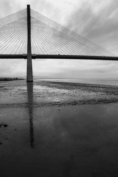 The Vasco Da Gama bridge on a cloudy day Stock Photos