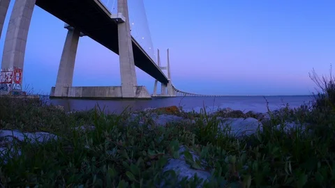 Vasco da Gama bridge during dusk in Lisbon Stock Footage 93352175