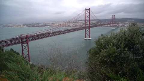 Vasco da Gama bridge over the Tagus river at sunset in Lisbon, Portugal, aerial Stock Footage 104183764