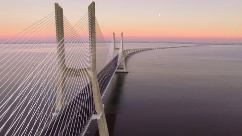 Vasco da Gama Bridge at Sunset in Lisbon, Portugal, Aerial View Stock Footage 80761407