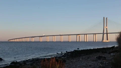 Vasco da Gama brige in sunset light. view from shore Stock Footage 72064533
