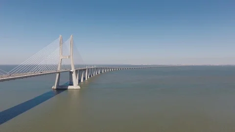 Vasco da Gama Cable stayed bridge river tagus in lisbon Portugal aerial shot 4k Stock Footage 105127256